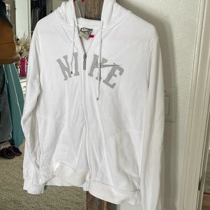 White and grey Nike zip up